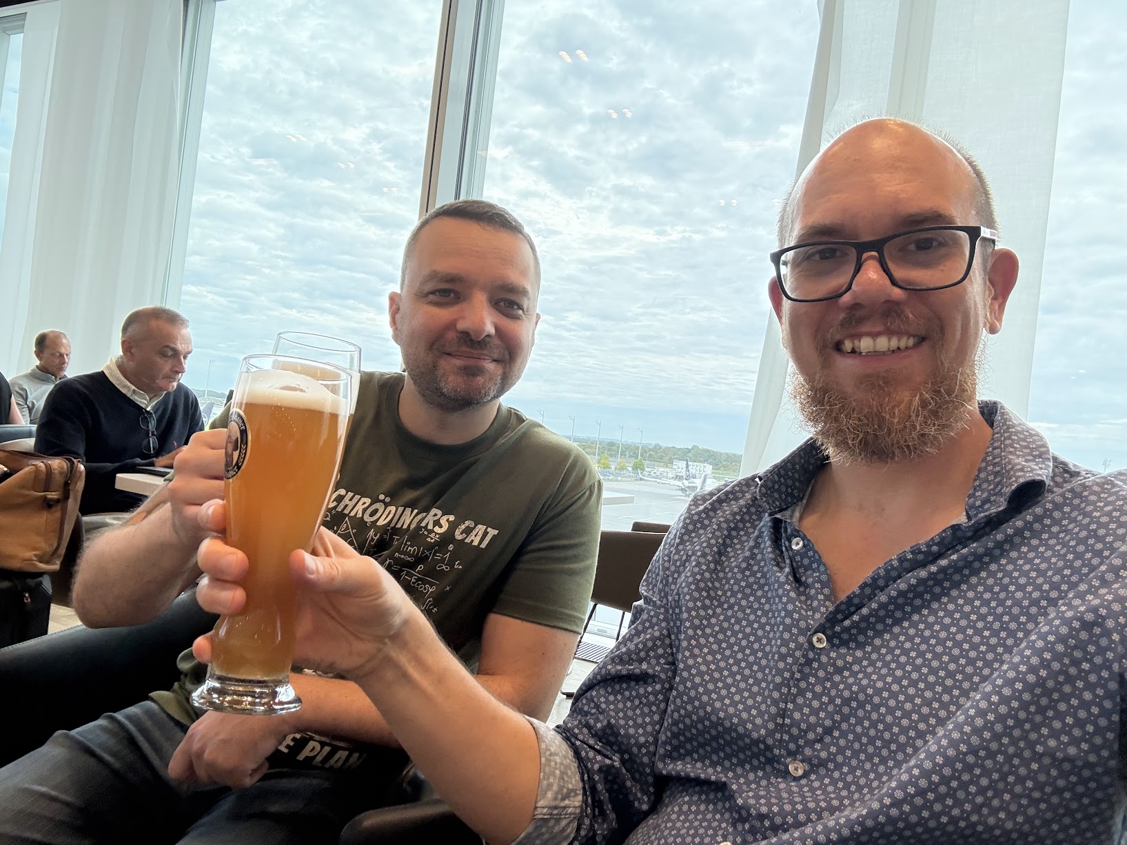 Meeting Friends At The Airport And Having A Beer